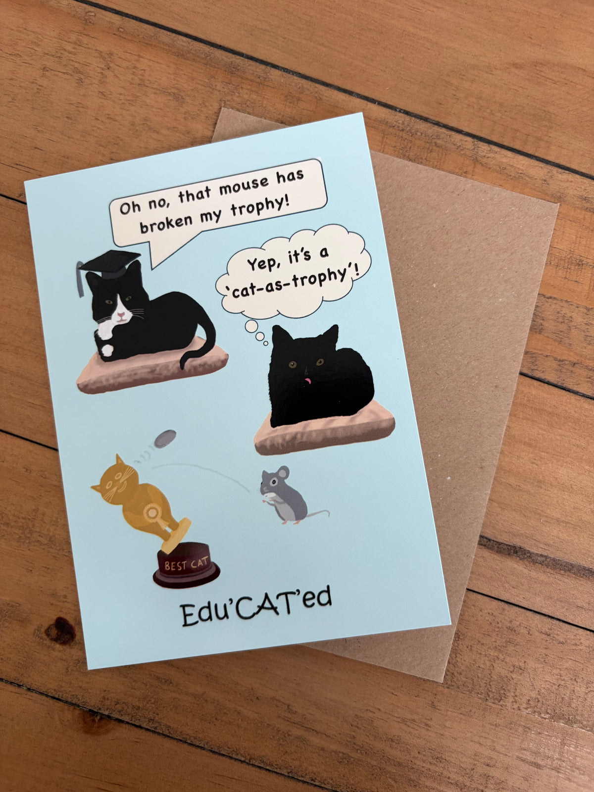 Edu’CAT’ed Cat-as-trophy    (blank inside)